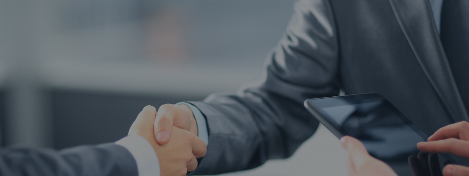 Business partners shaking hands